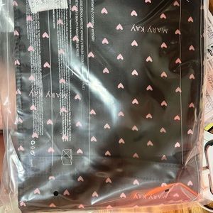 Mary Kay Brand new never taken out of the package, roll up and hang up bag.